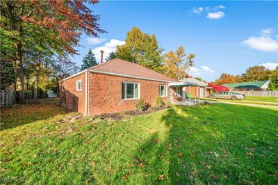 View of side of property featuring a yard | Image 2