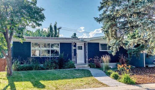411 Woodland Cres Se, Calgary, AB, T2J1J7 | Card Image
