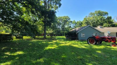 Large private back yard offers plenty of space to | Image 2