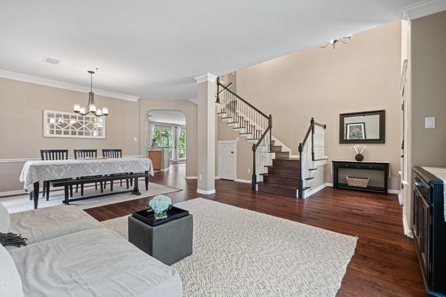 Set to the left of the entry, the formal dining room feels relaxed—filled with soft light and just enough separation to make every meal feel a little more special | Image 7