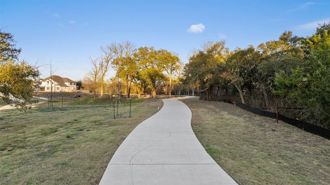 View of home's community featuring a yard | Image 35