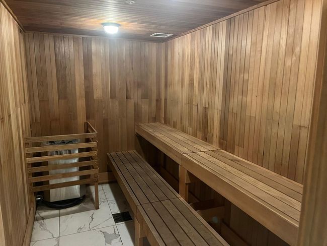 View of sauna with marble finish floor | Image 23