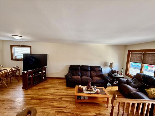 Living room featuring light hardwood / wood-style flooring | Image 13