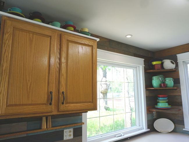 Kitchen with water views. Island is on wheels. | Image 13