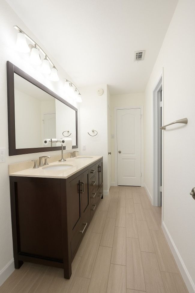 2nd floor full bathroom1 featuring double vanity and wood tiled floors | Image 18