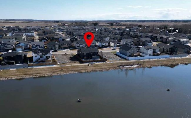 26 Mackenzie Ave, House other with 5 bedrooms, 3 bathrooms and 2 parking in Lacombe AB | Image 43