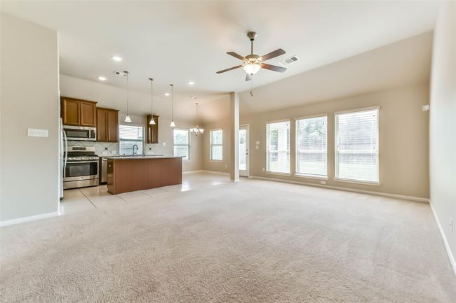 living room open to kitchen and breakfast area | Image 10