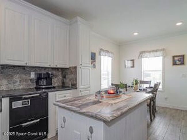 623 Hyacinth Cir, House other with 3 bedrooms, 2 bathrooms and null parking in Barefoot Bay FL | Image 17
