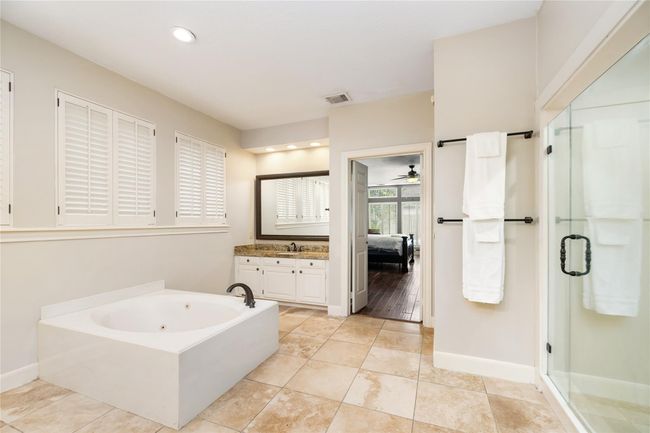 With its oversized layout and sleek design, the walk-in shower offers plenty of room to move and unwind—perfect for starting your day or winding down in comfort. | Image 25