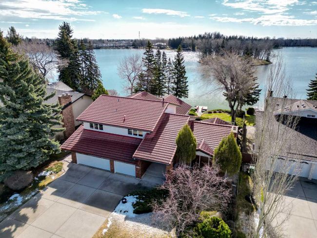 12236 Lake Erie Way Se, Home with 4 bedrooms, 3 bathrooms and 9 parking in Calgary AB | Image 1
