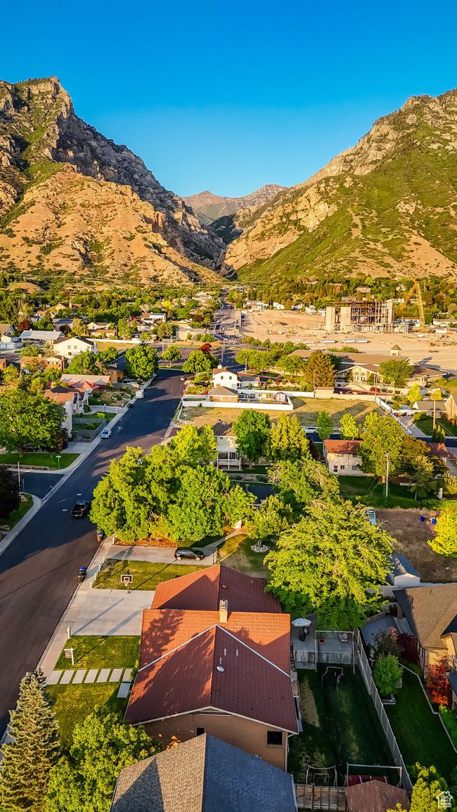 Aerial perspective of suburban area featuring a mountainous background | Image 45