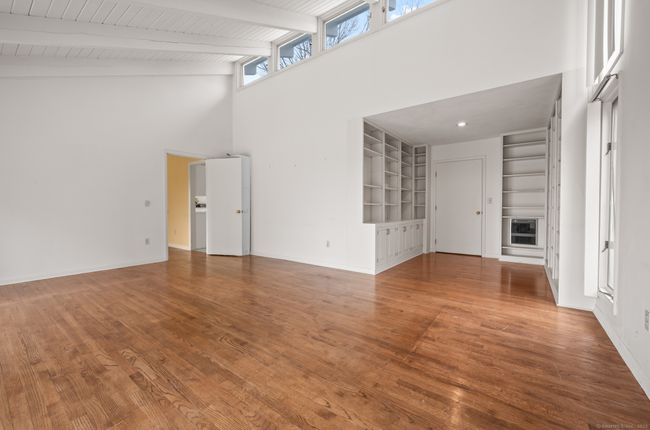 Livingroom leads to Dining Room/Den. | Image 8