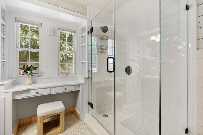 You'll feel relaxed and refreshed in this bright and spacious shower. | Image 11