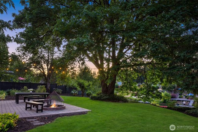 Entertain beneath open skies or unwind on sunlit patios surrounded by lawn, trees, and endless possibilities. | Image 27