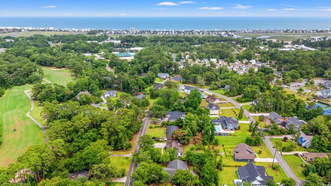 View of property location featuring nearby suburban area and a golf club | Image 32