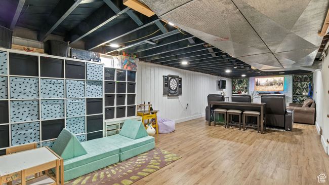 Living area with wood finished floors | Image 16