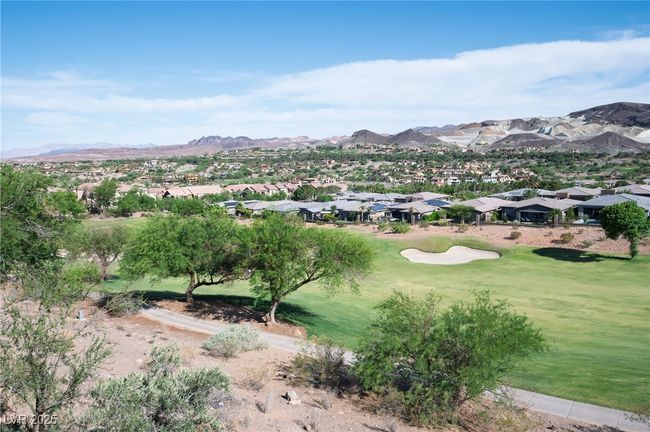 View of mountain backdrop with nearby suburban area and a local golf course | Image 23