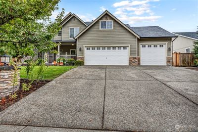 Welcome to this lovely 4 bedroom spacious home in the Wellancort Community, next to JBLM. | Image 1