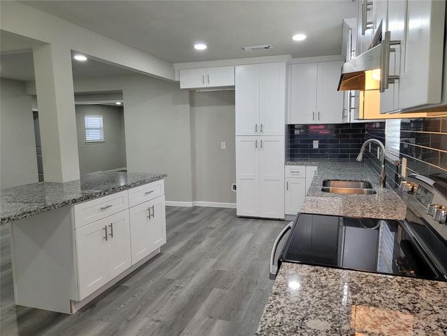 Kitchen with soft close drawers and cabinets. and Granite tops. Quality materials. | Image 5