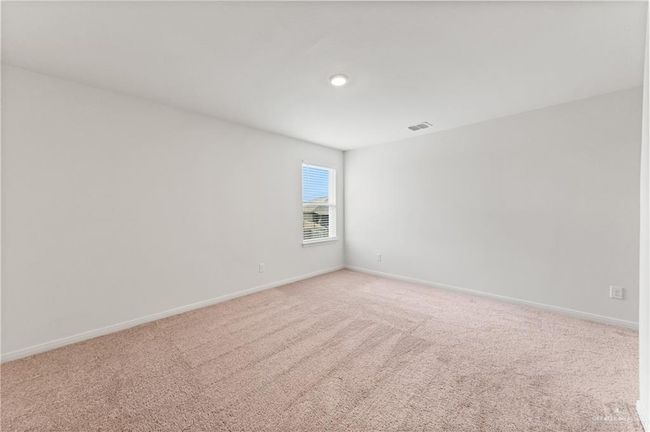 Spare room featuring light carpet, baseboards, and recessed lighting | Image 21