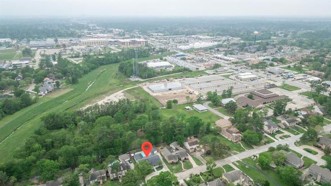 The land behind property is owned by the church that fronts Louetta. Property is not in a flood zone and has never flooded. | Image 48