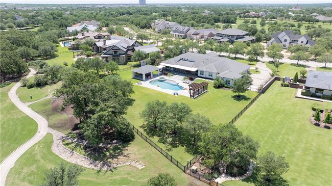 Aerial view of residential area featuring a pool | Image 31