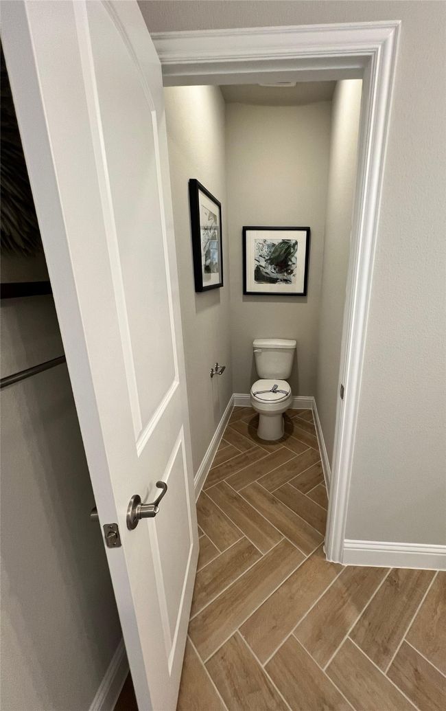 Bathroom featuring parquet floors | Image 18