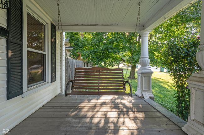 wooden terrace with a yard | Image 5