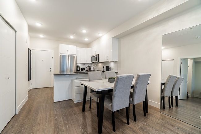 Dining area featuring baseboards, recessed lighting, and dark wood finished floors | Image 12