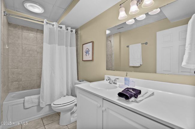2nd Bathroom, bathtub & hookless waffle shower curtain with sheer mesh top | Image 34