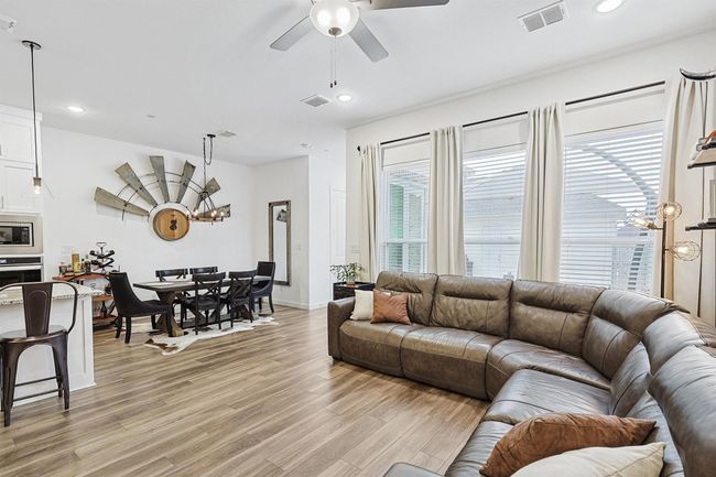Living room overlooks the private backyard | Image 10