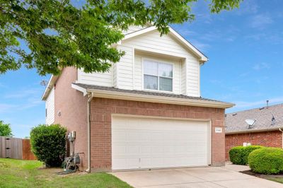 Front of property featuring a garage | Image 3