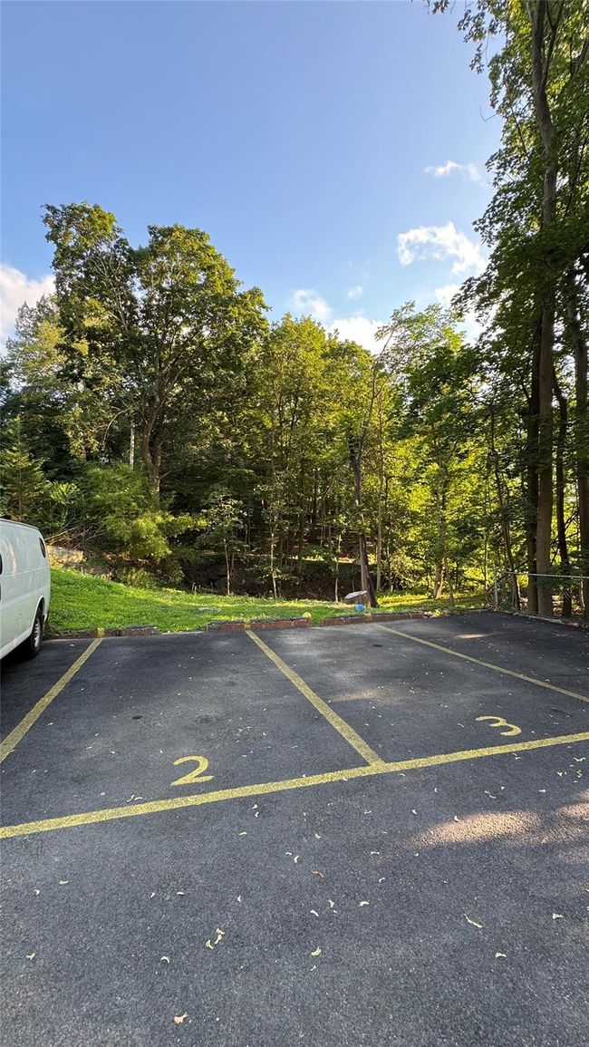 View of uncovered parking lot | Image 21
