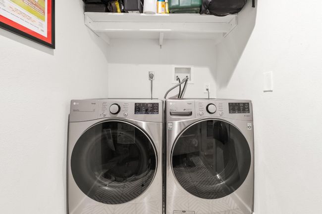 Clothes washing area with washing machine and clothes dryer | Image 13