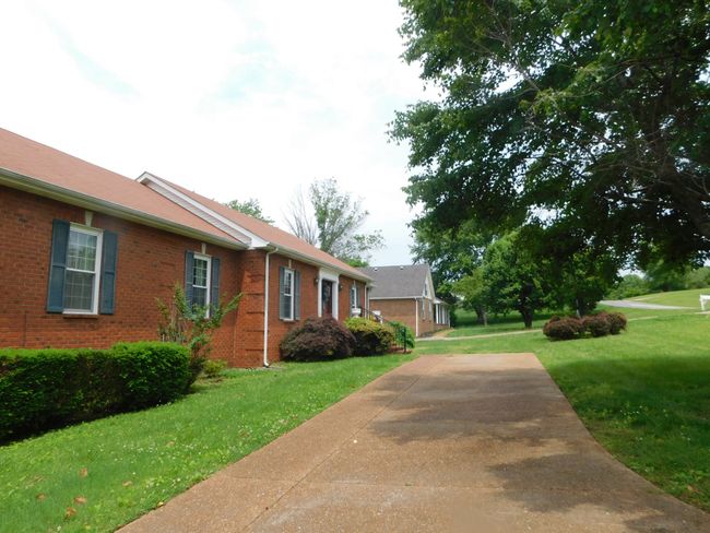 A double Front Parking Pad and Driveway | Image 4