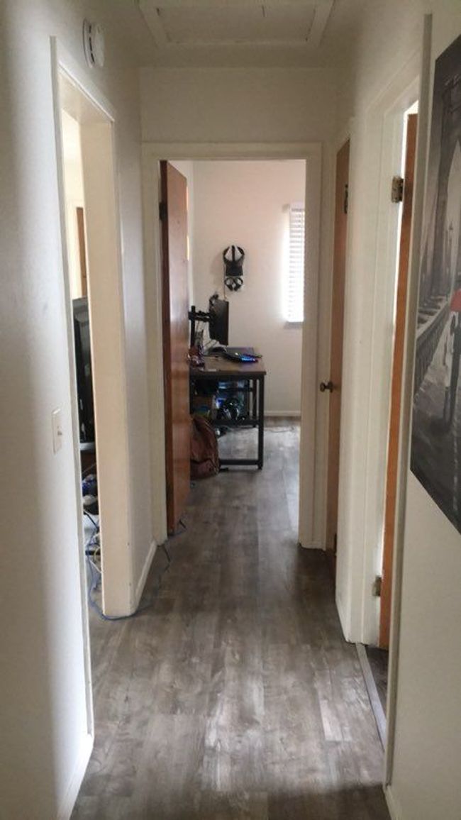 Hallway to Bedrooms... | Image 8