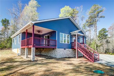 Covered Deck 12x16 with ceiling fan off the dining area and kitchen - great place to have breakfast or your morning coffee | Image 3