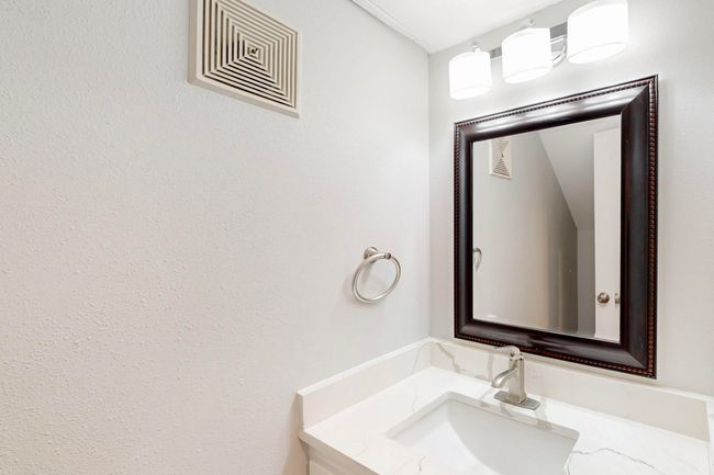 Bathroom featuring visible vents and vanity | Image 17