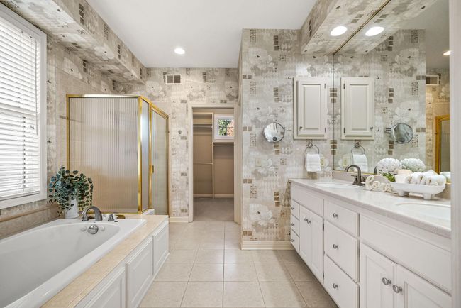 Primary bathroom with heated flooring and double sinks | Image 21