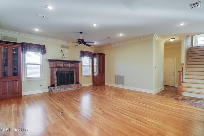 Den with fireplace | Image 19