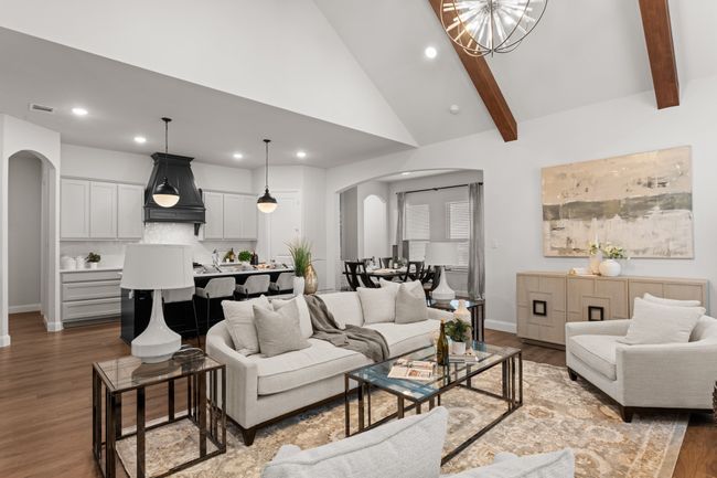 Open and ready for fun gatherings. View into the kitchen and dining space. | Image 10