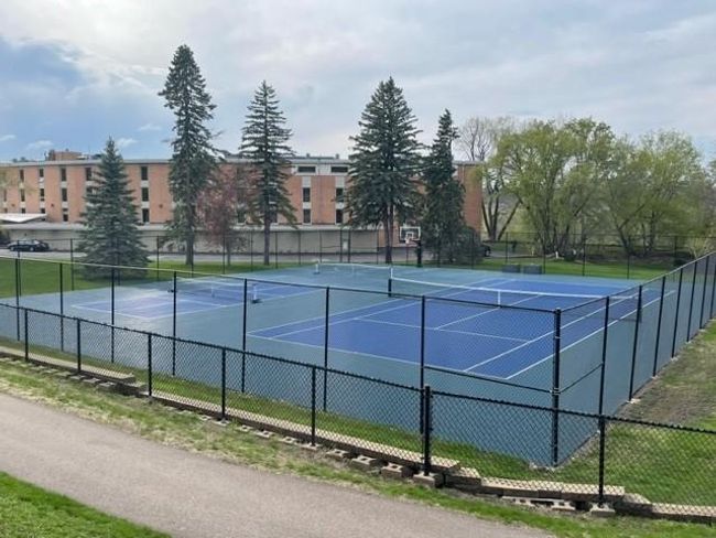 Outside you can enjoy tennis or pickleball | Image 31