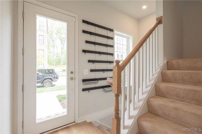 Foyer entrance featuring baseboards, recessed lighting, and stairway | Image 4