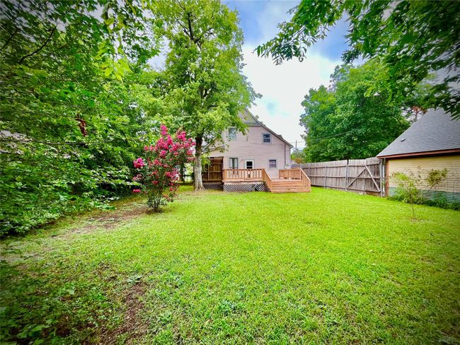 View of yard featuring a deck | Image 20