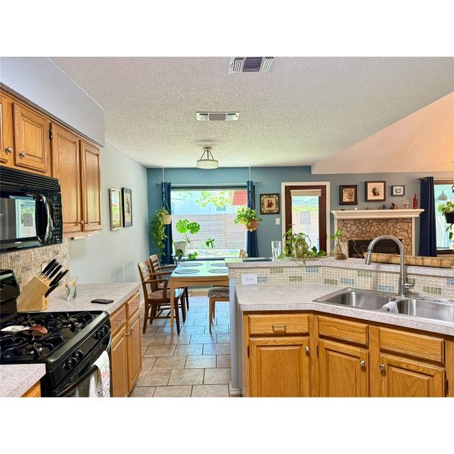 Kitchen, Breakfast Dining, and Family Room All Open Up Together! | Image 21