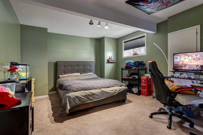 569 Boulder Creek Circle Se, House other with 4 bedrooms, 3 bathrooms and 6 parking in Langdon AB | Image 44