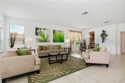 4574 Mariel Loop, House other with 6 bedrooms, 5 bathrooms and null parking in Kissimmee FL | Image 2