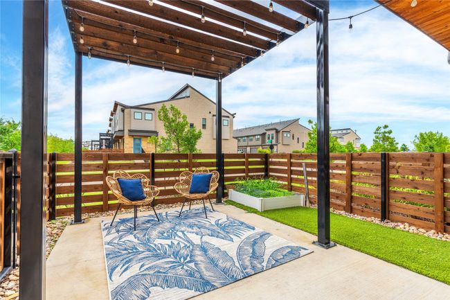 View of patio with a residential view | Image 5