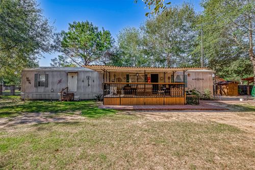 1305 County Road 3406, Cleveland, TX, 77327-2217 | Card Image