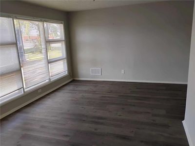 Empty room with dark hardwood / wood-style flooring | Image 3